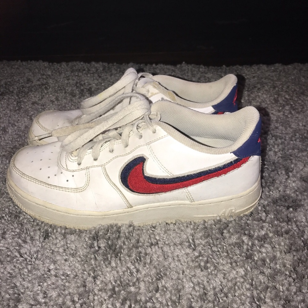 Blue and red Nike Air Force 1s